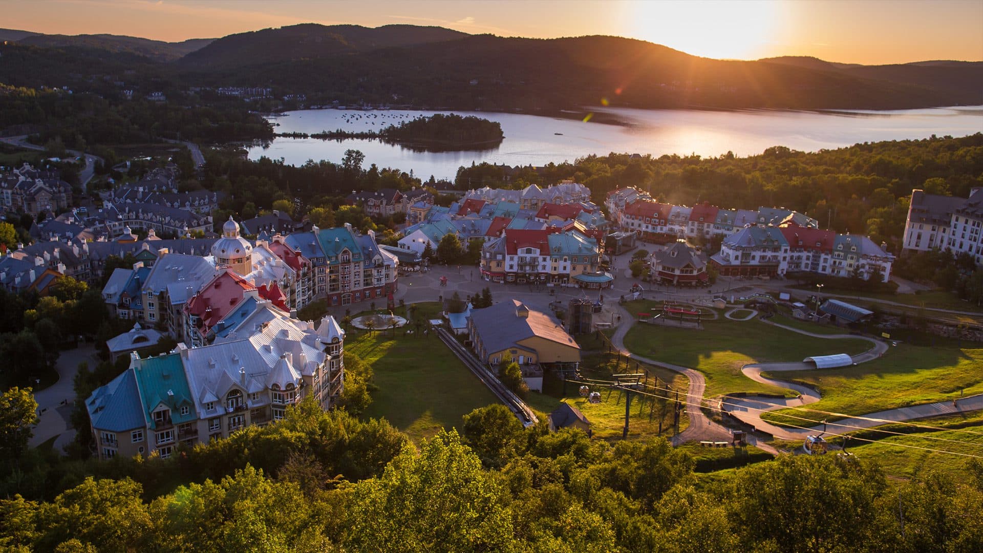 A stunning view of the pedestrian village and Lake Tremblant at sunrise.
