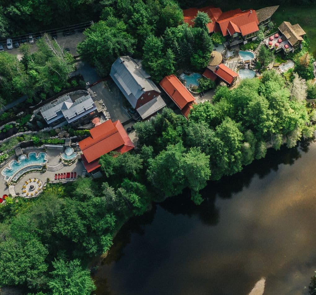 Aerial view of a Nordic spa in Mont-Tremblant, along the Diable's river.